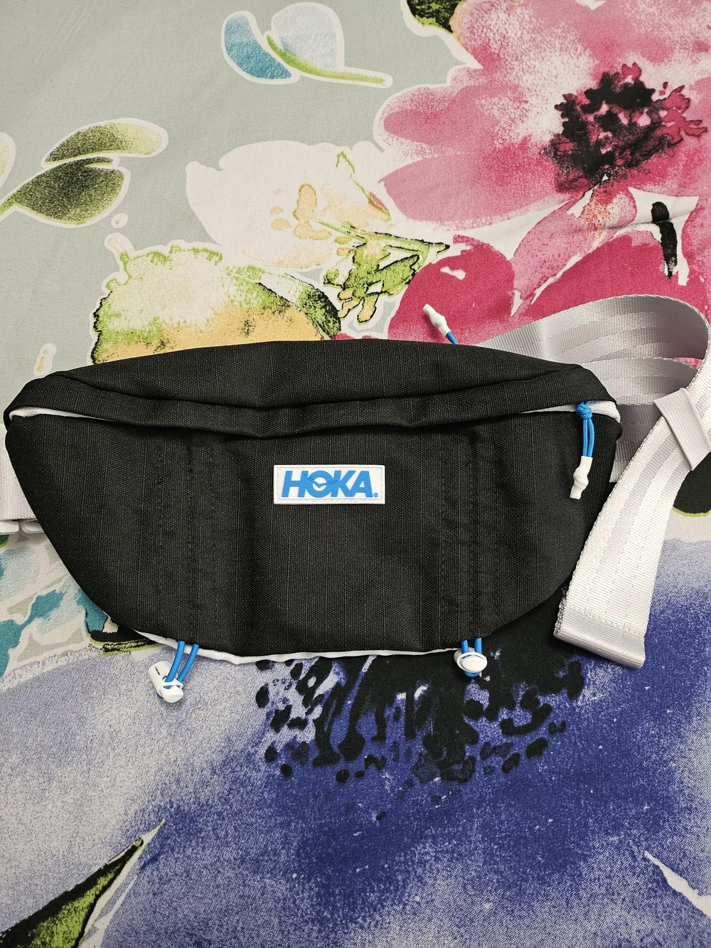 Hoka Black Waist Pack with White Strap and Blue Accent Pulls